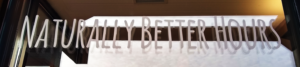 Naturally Better Hours Sign